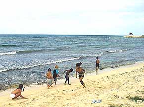 Children playing on west beach at silver sand