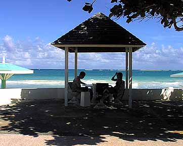 Silver sands patio overlook the beach and sea