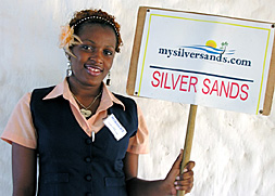 mysilversands rep with silver sands sign