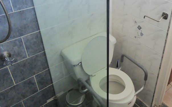 elevate toilet with arms in Bathroom 3