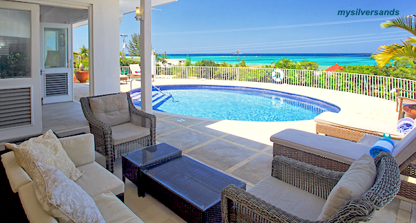 lounge area beside pool