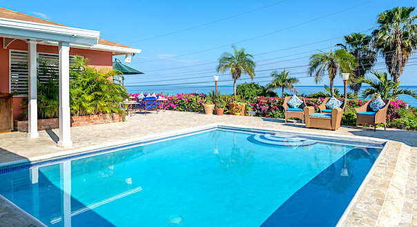 pool and sea view at summertime villa