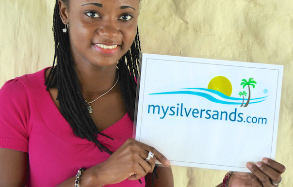 Rep holding mysilversands sign with logo