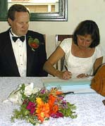 Mary signs the register.