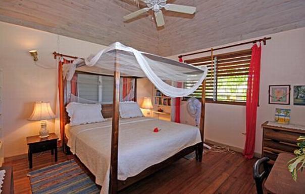 master bedroom of seashell cottage, silver sands villas jamaica