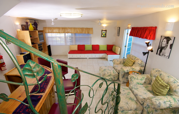 view of the entertainment room from the stairs in blue moon villa silver sands jamaica