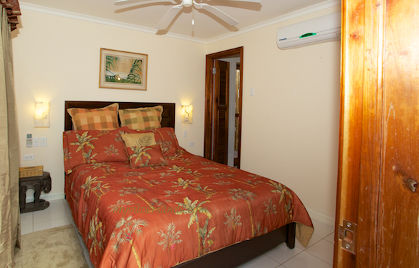 bedroom four of blue vista is furnished with a queen size bed