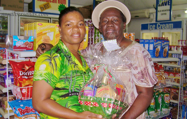 constance of tu mac villa in silver sands jamaica receiving her christmas gift basket