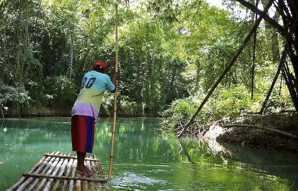 captain on bamboo raft on martha brae river jamaica