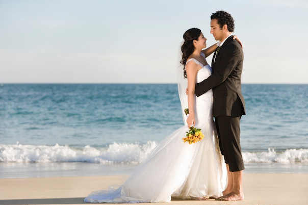 wedding bride and groom on beach