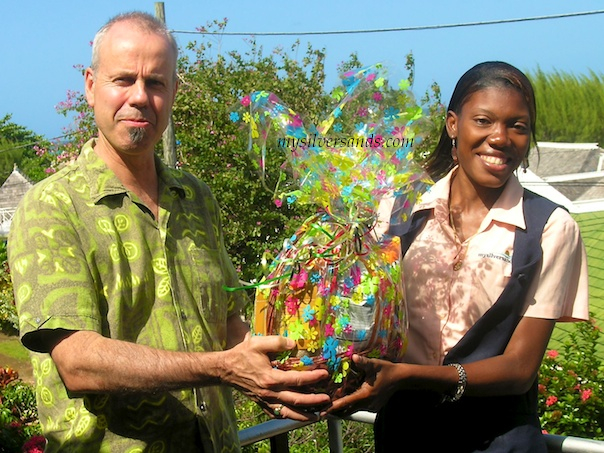 guest, bruce fairless, and kimesha, mysilversands rep, with gift basket