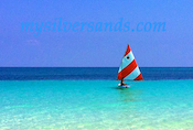 sunfish sailboat sailing into silver sands jamaica