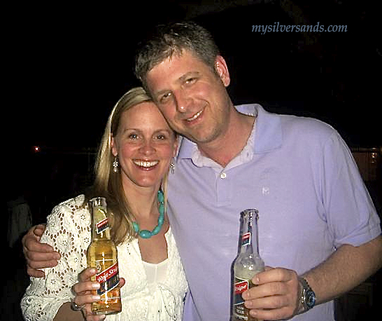 peter and lara neal at silver sands villas welcome party