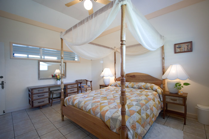 bedroom 3 with queen canopy bed