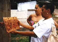 Chris and angela examine their purchase