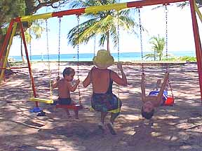 Children swings in the play area at silver sand