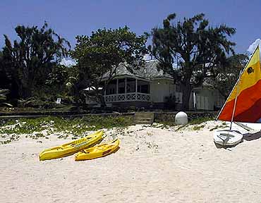 view of queen's cottage from the beach