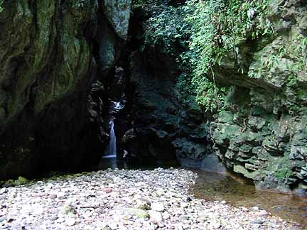 waterfall, stream flowing to the mini dam