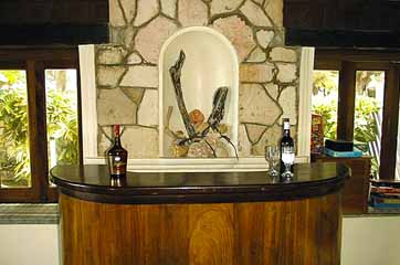 This charming bar is the focal point of the living room, the social centre of Rum Jetty