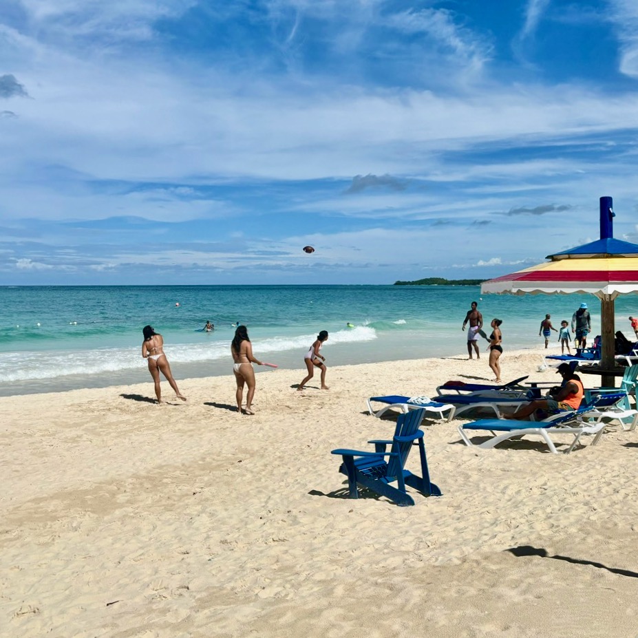 people playing on the beach