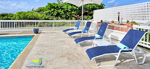 lounge chairs on pool deck at aberdeen villa