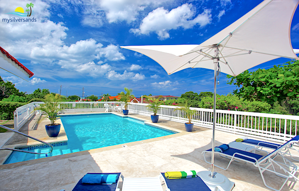 lounge chairs by the pool