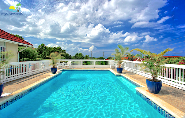 pool lines the north side of the villa