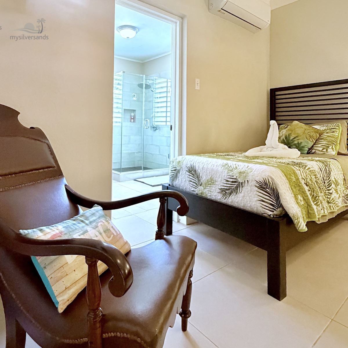 bedroom 2 with twin beds and armchair