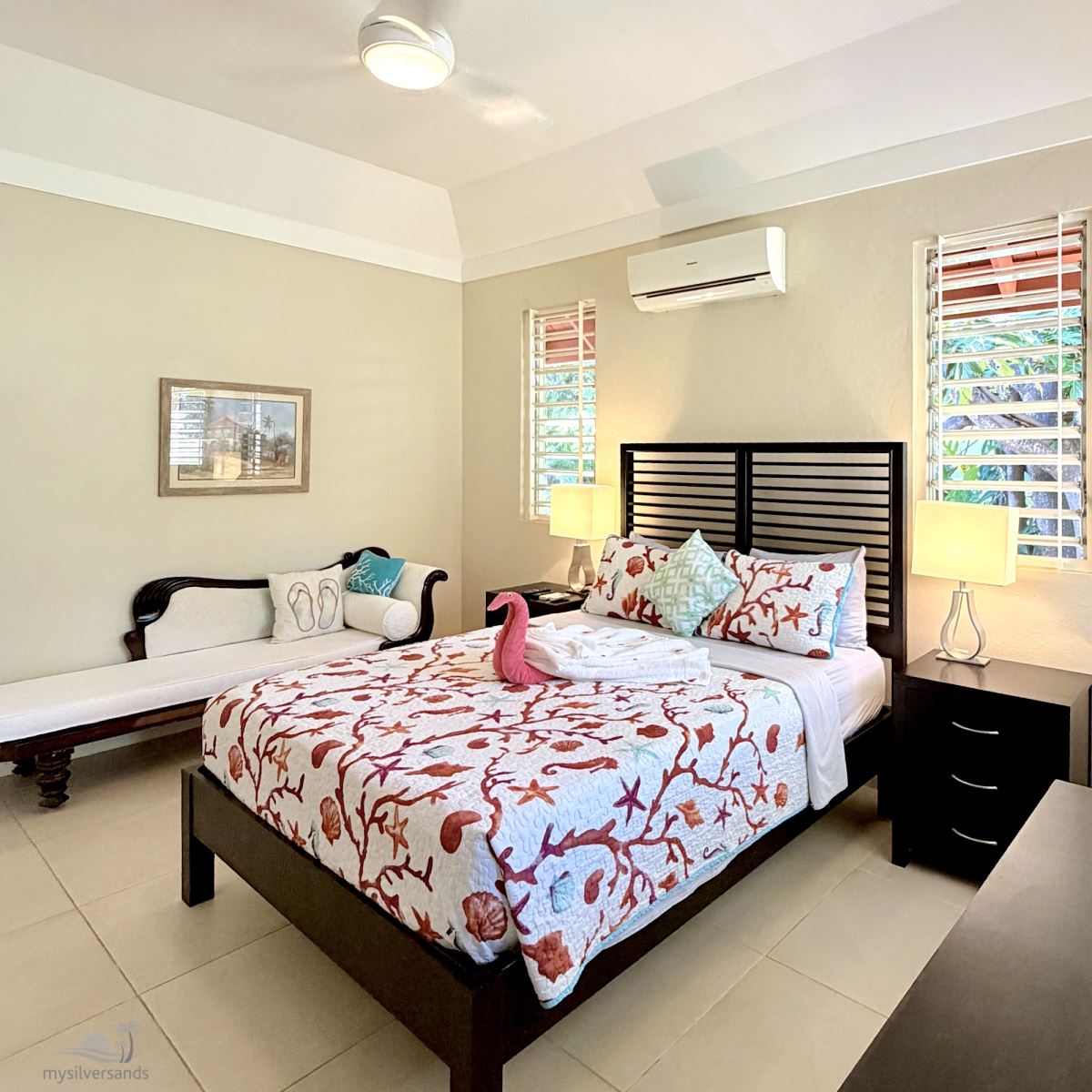 bedroom 3 with queen bed and loveseat