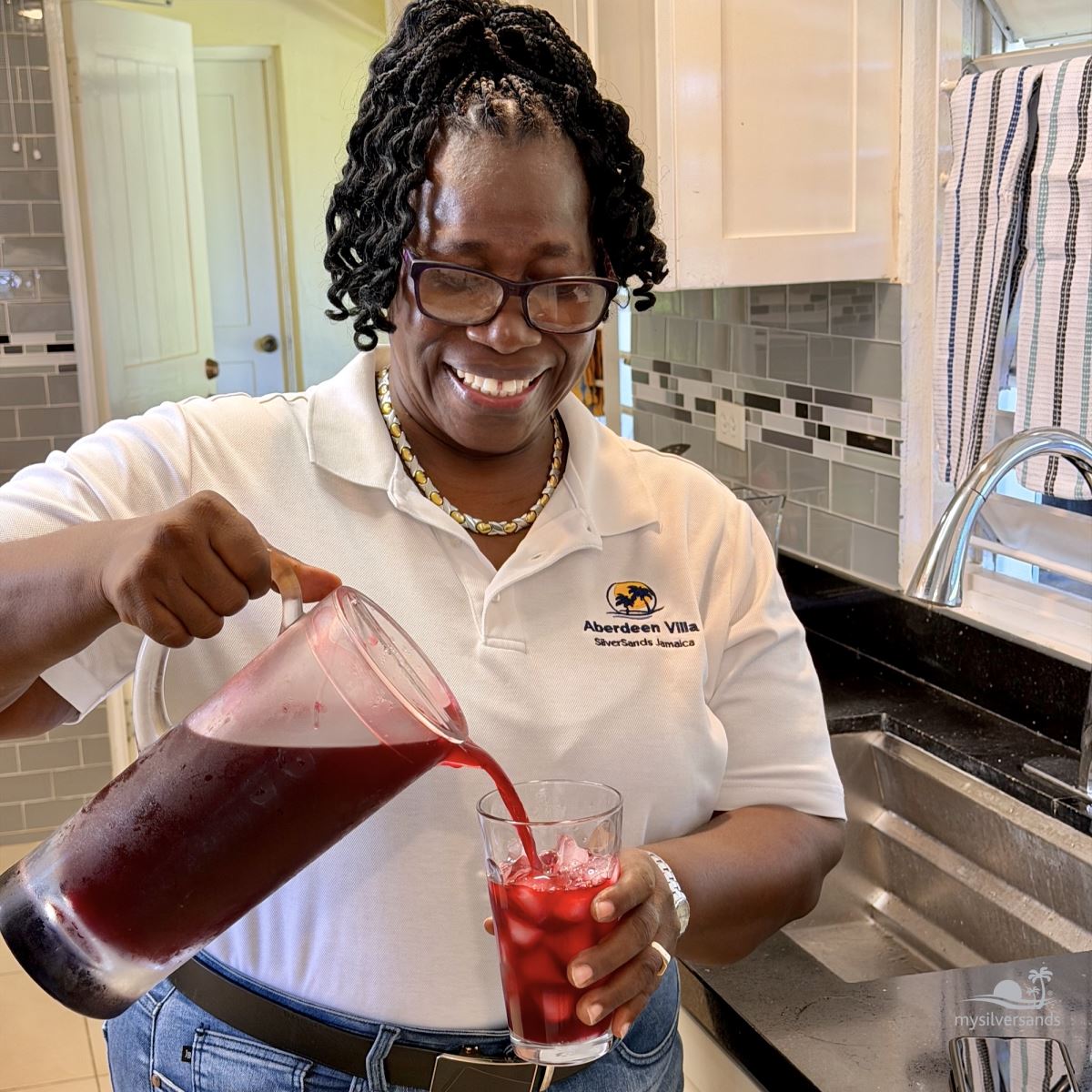 esther pouring sorrel drink