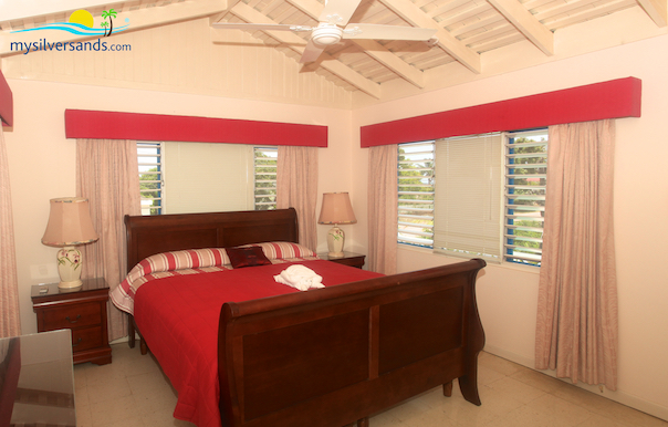 bedroom 1 with king bed at beach house