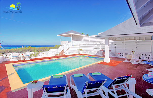 blue vista pool and gazebo with sea view