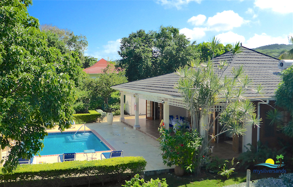 aerial view of pool and villa 