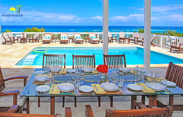 pool, expansive deck and sea view