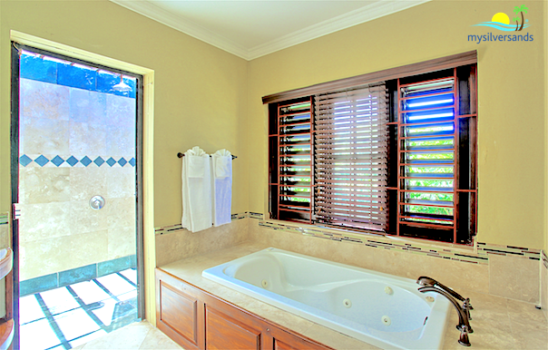 bathroom 1 with tub and outdoor shower