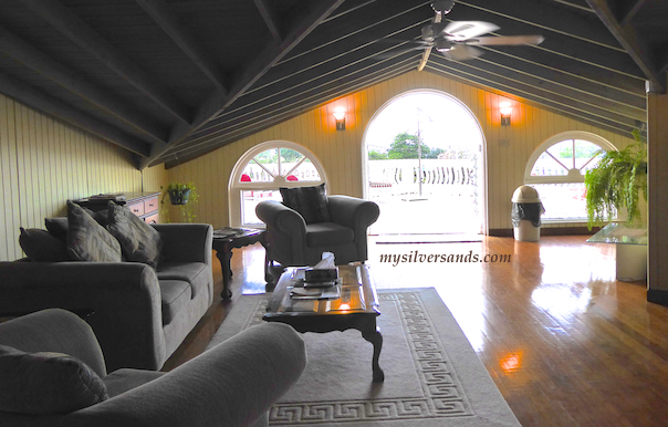 upstairs living room opens to balcony and sea view