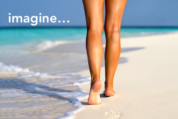 woman walking barefoot on beach