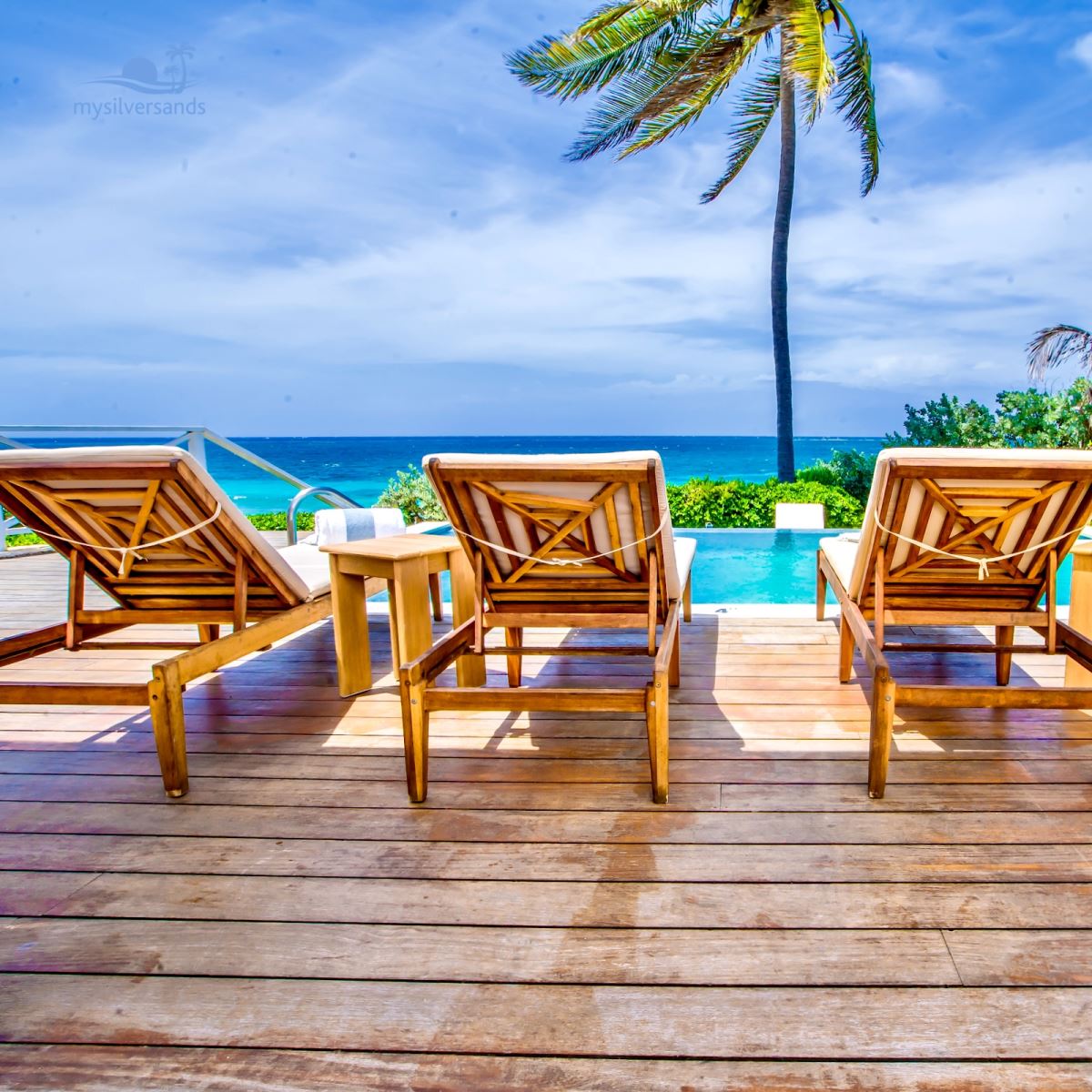 pool deck with lounge chairs