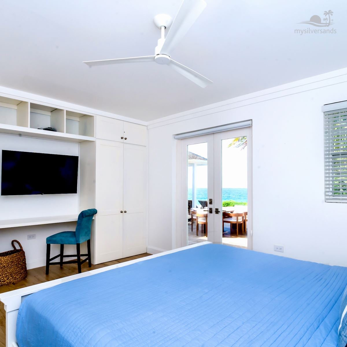 bedroom one opens out to pool deck