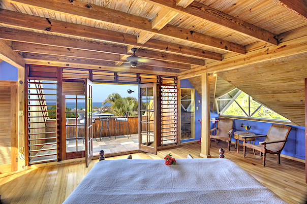 king bed and balcony with sea view