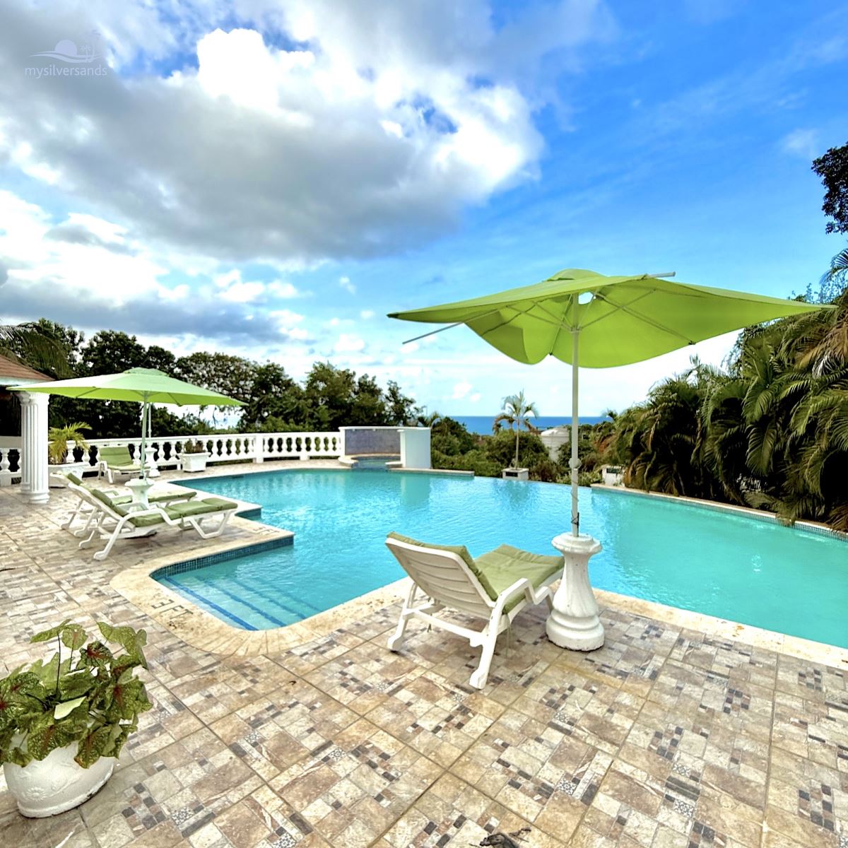 pool deck, pool and view