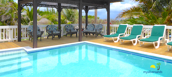 pool and gazebo and lounge chairs