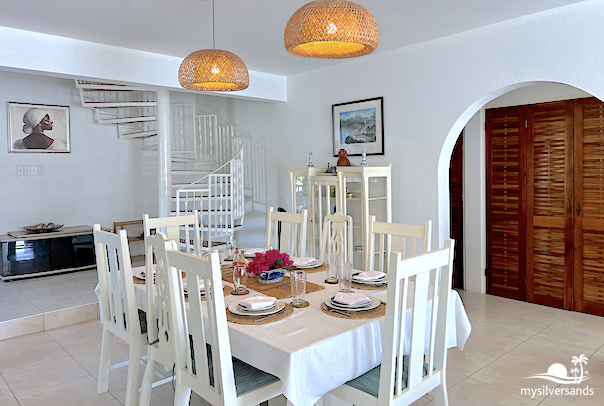 dining room with staircase to Bedroom 1