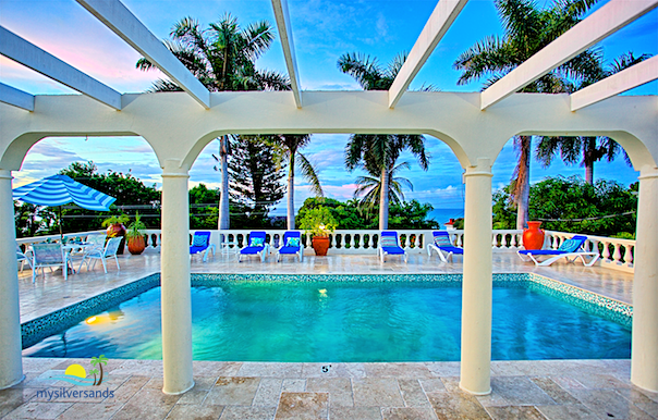 the royal palms pool at sunset