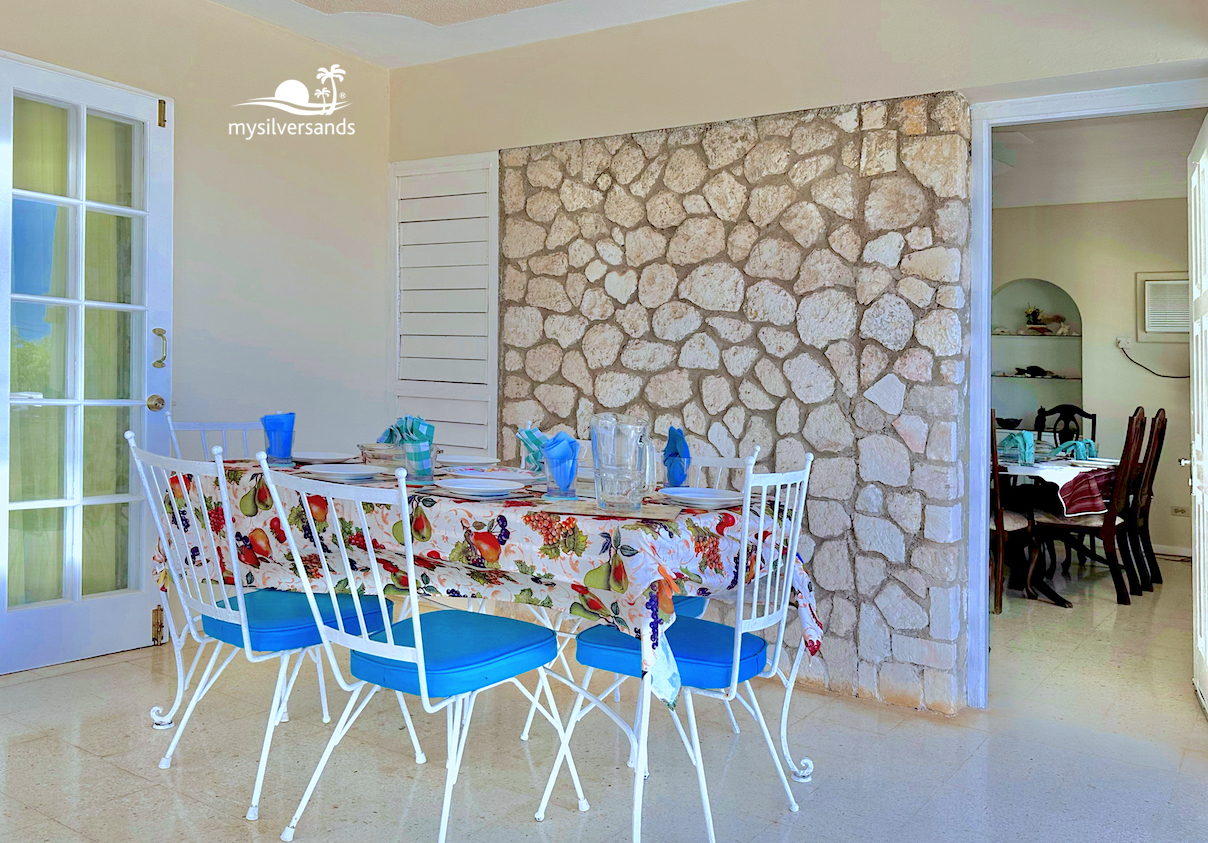 dining on the verandah beside the pool