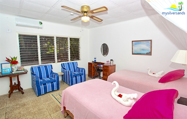 comfortable armchairs in bedroom 2