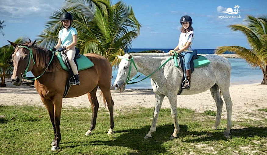 2 girls on horses