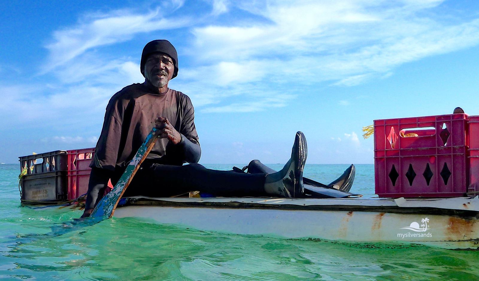 shine on his old windsurf board