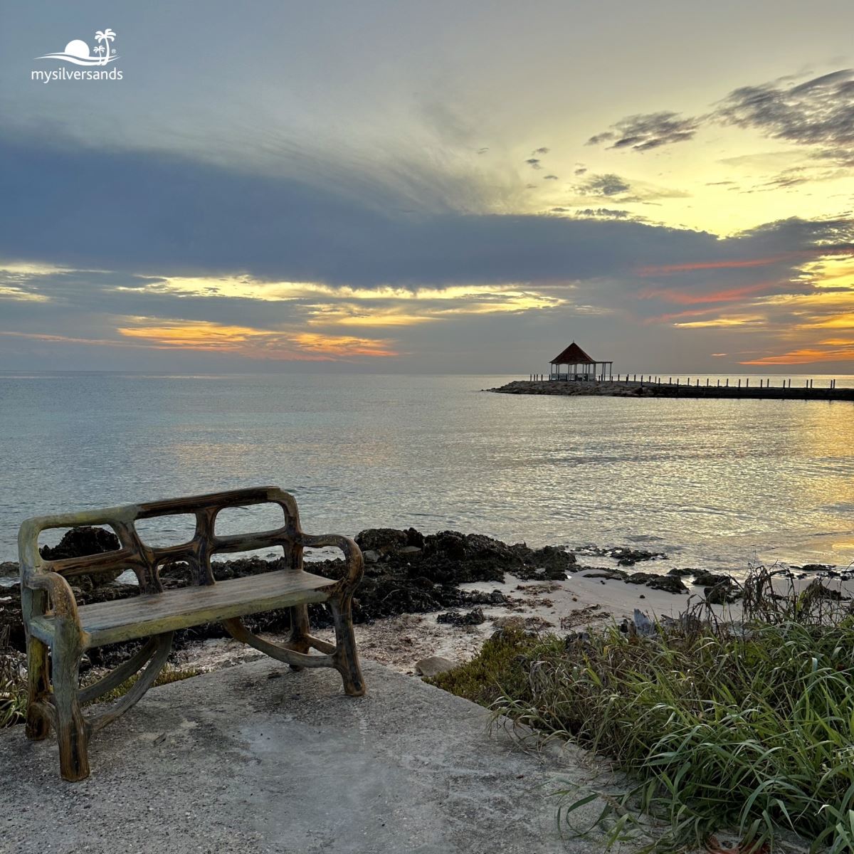 west beach bench on yoga platform at sunrise