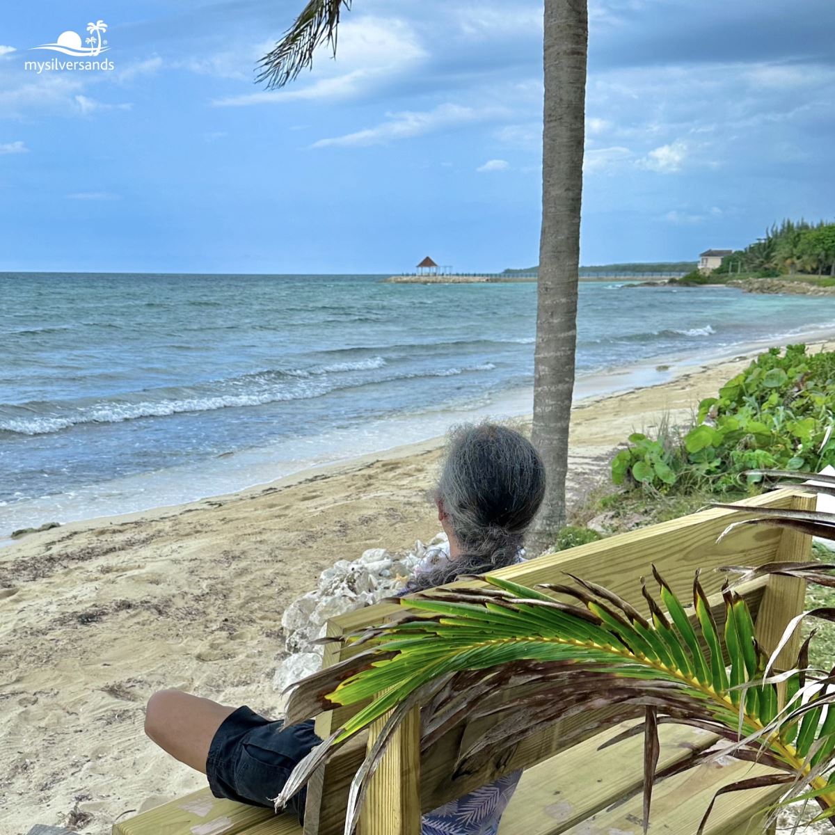 prem on bench looking to jetty